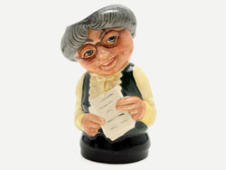 Doultonville Miss Studious - William Harper was the creator of Doultonville, the city as well as all the cities larger than life characters, which he portrayed in his range of small size toby jugs. 